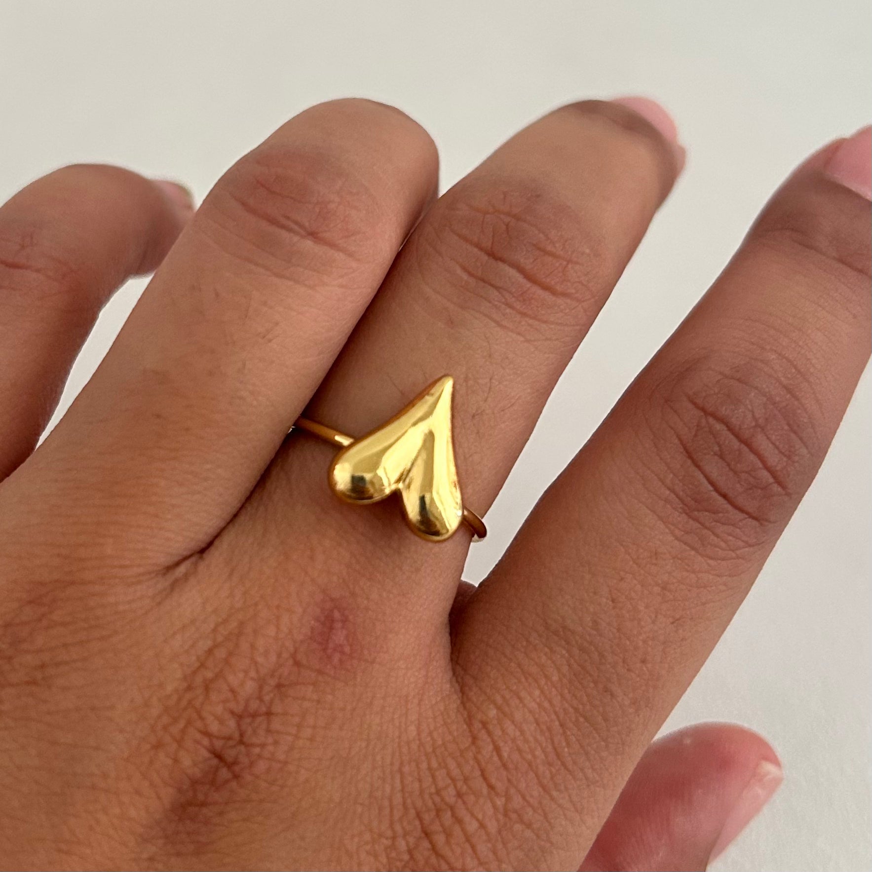 Golden Embrace Heart Statement Ring