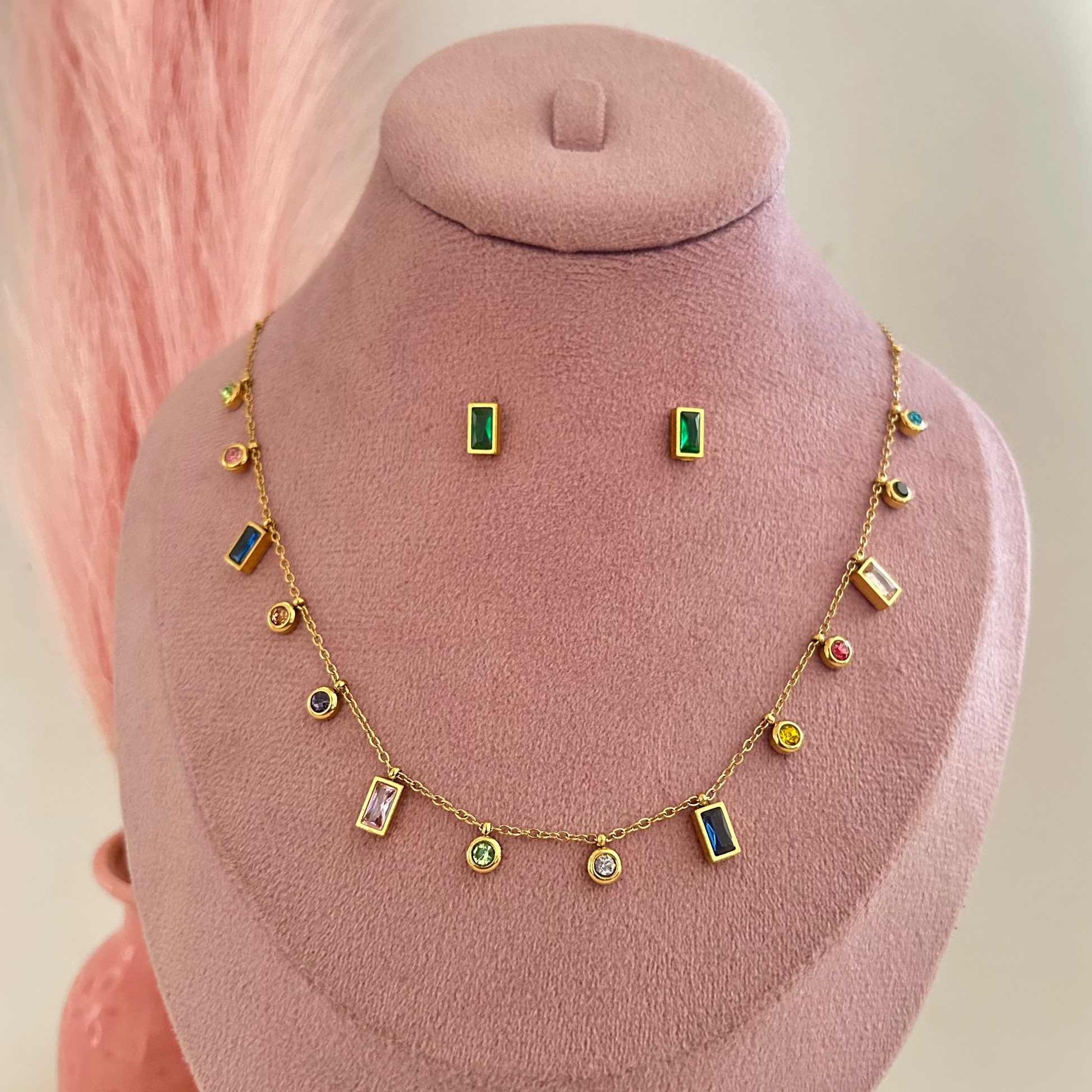 Gold necklace with geometric colorful charms and matching rectangular earrings