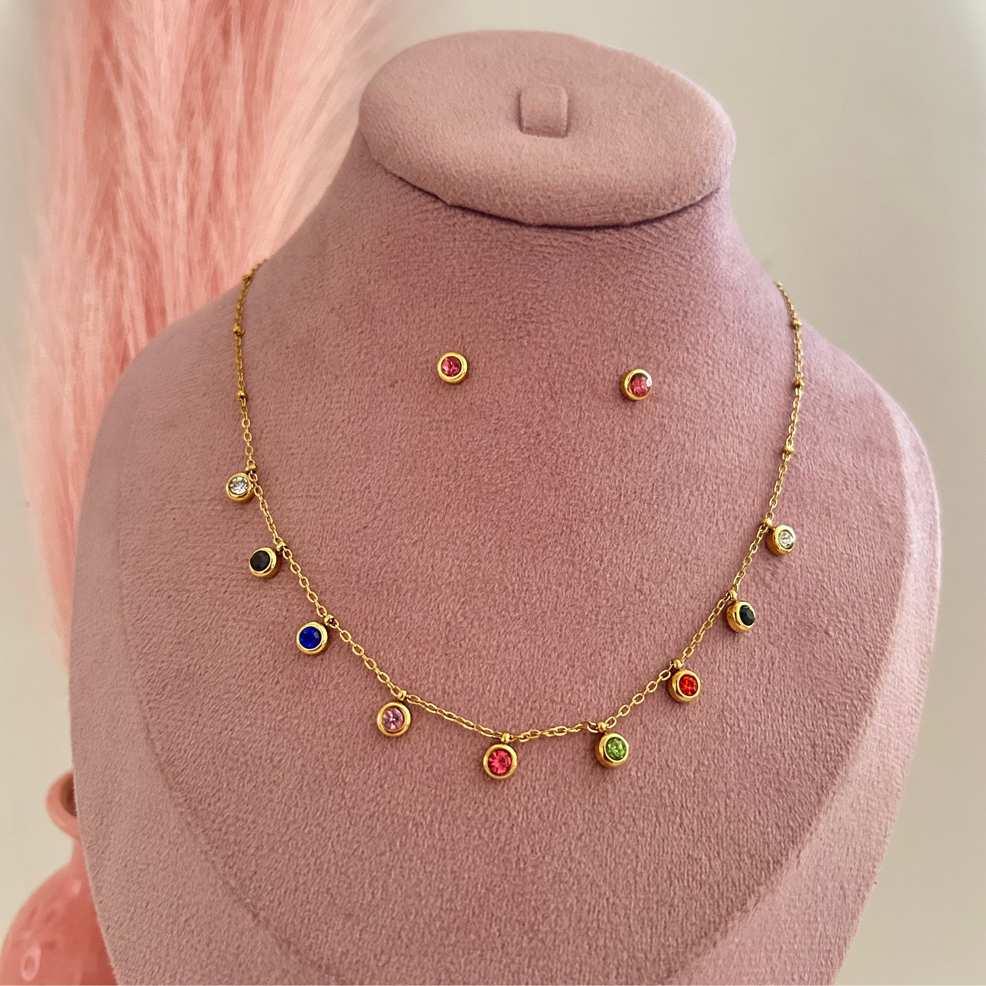 Gold chain necklace with colorful round charms and matching stud earrings
